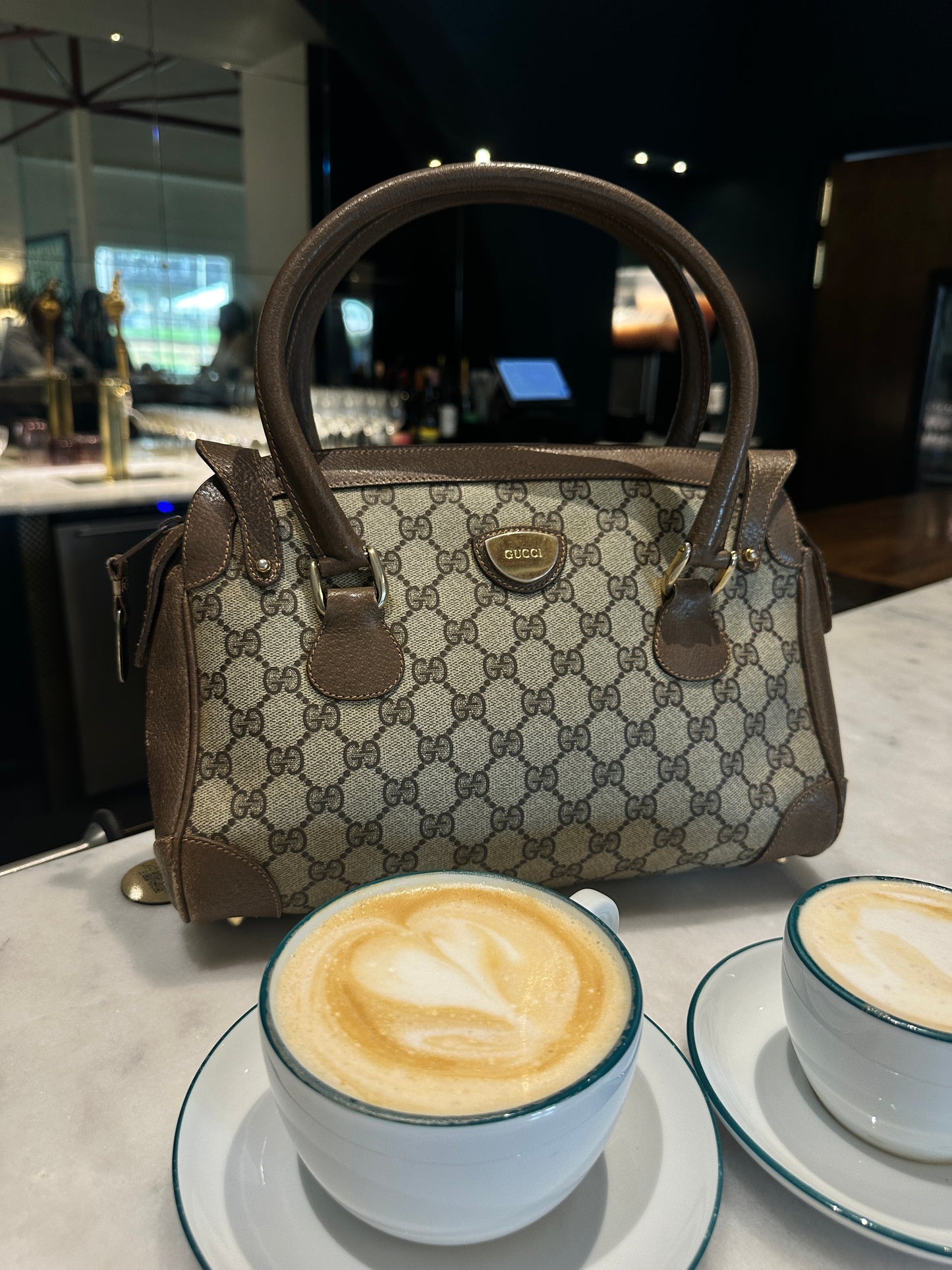 GUCCI monogramed leather shoulderbag