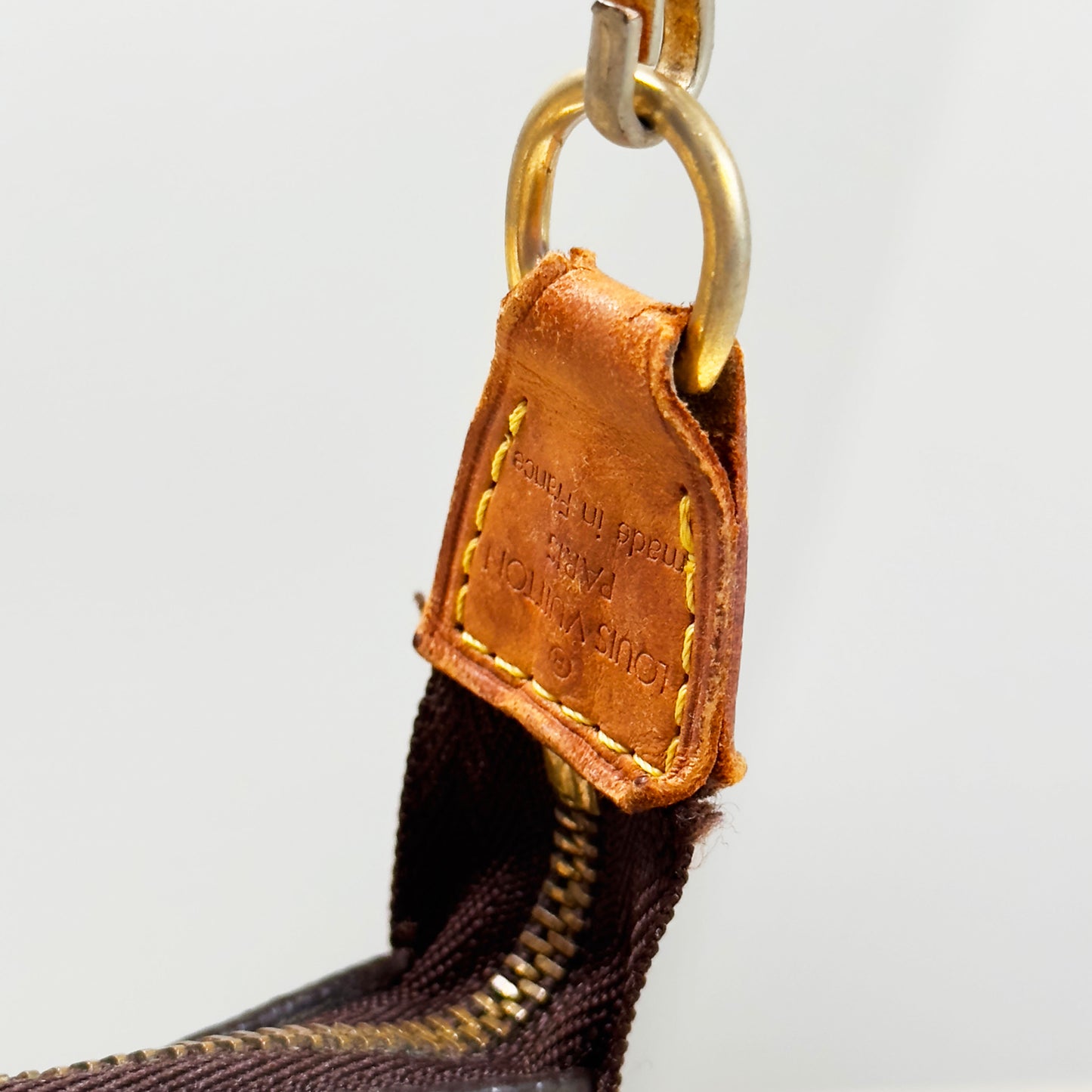 LOUIS VUITTON pochette with crossbody leather strap