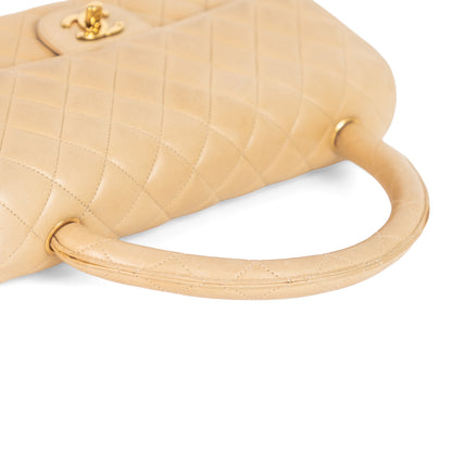 CHANEL top handle lambskin flap bag