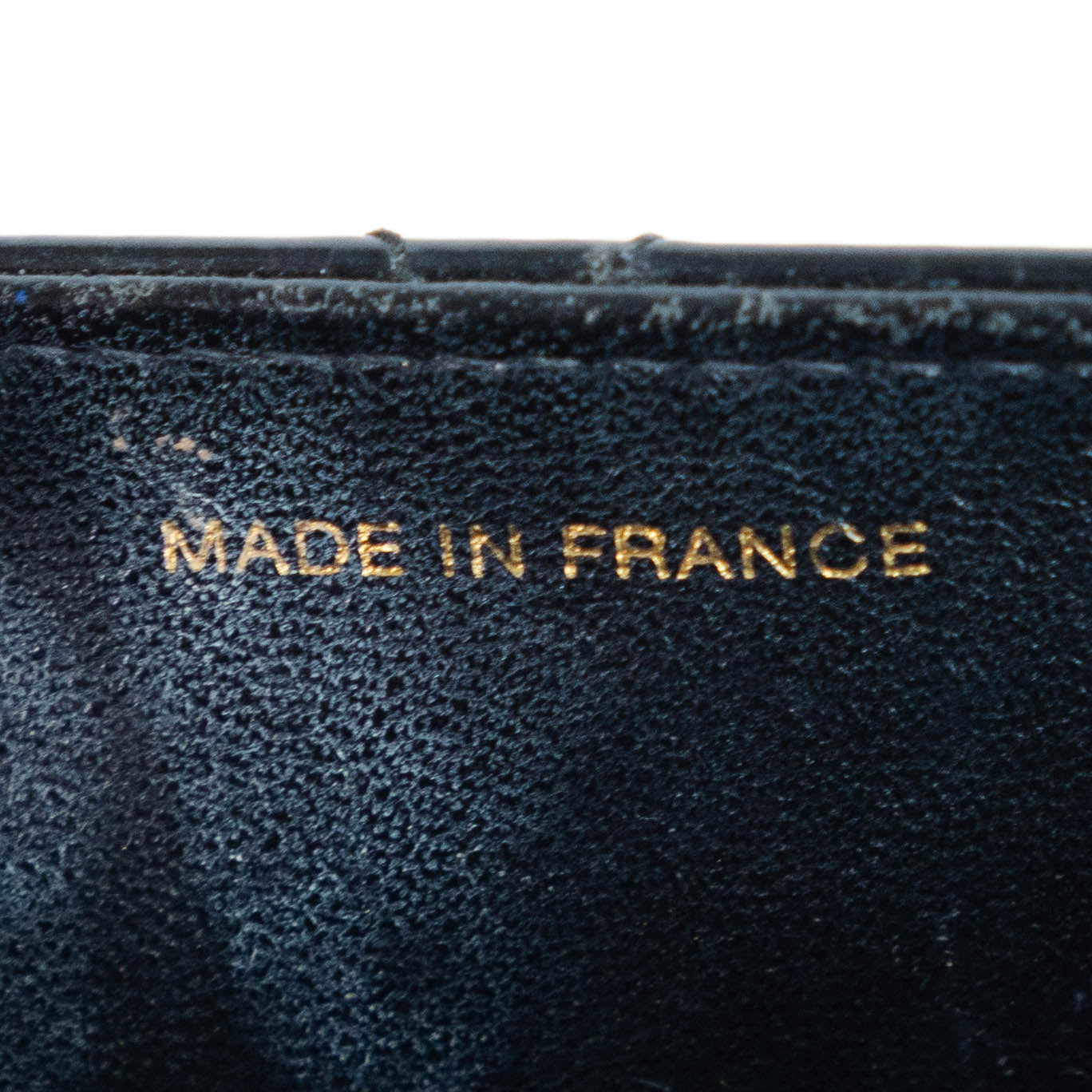 CHANEL quilted flap handle bag