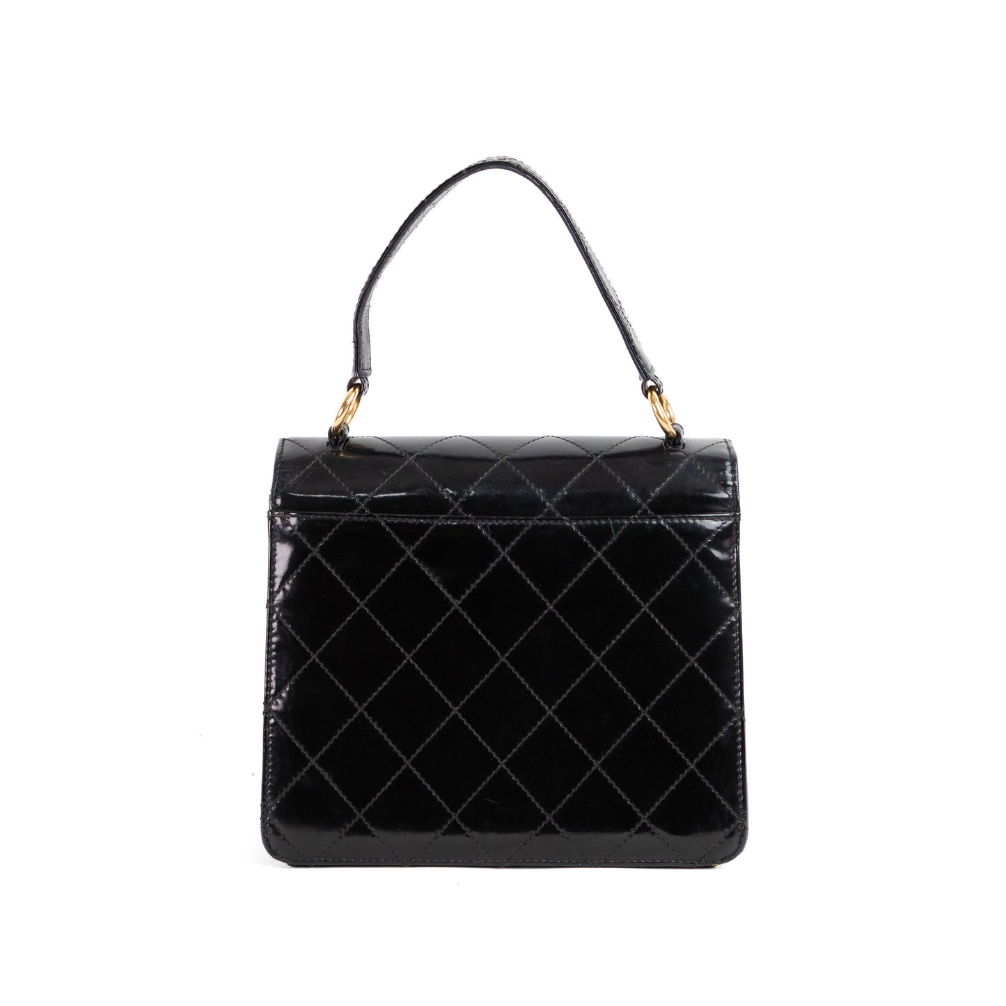CHANEL quilted flap handle bag