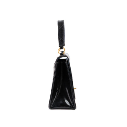 CHANEL quilted flap handle bag
