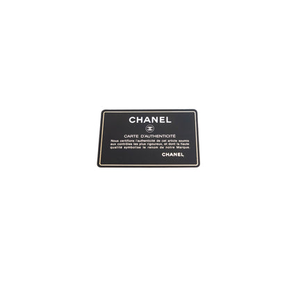CHANEL quilted flap handle bag