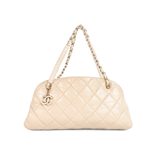 CHANEL beige quilted leather mademoiselle bowling bag