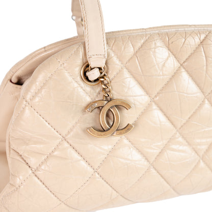 CHANEL beige quilted leather mademoiselle bowling bag