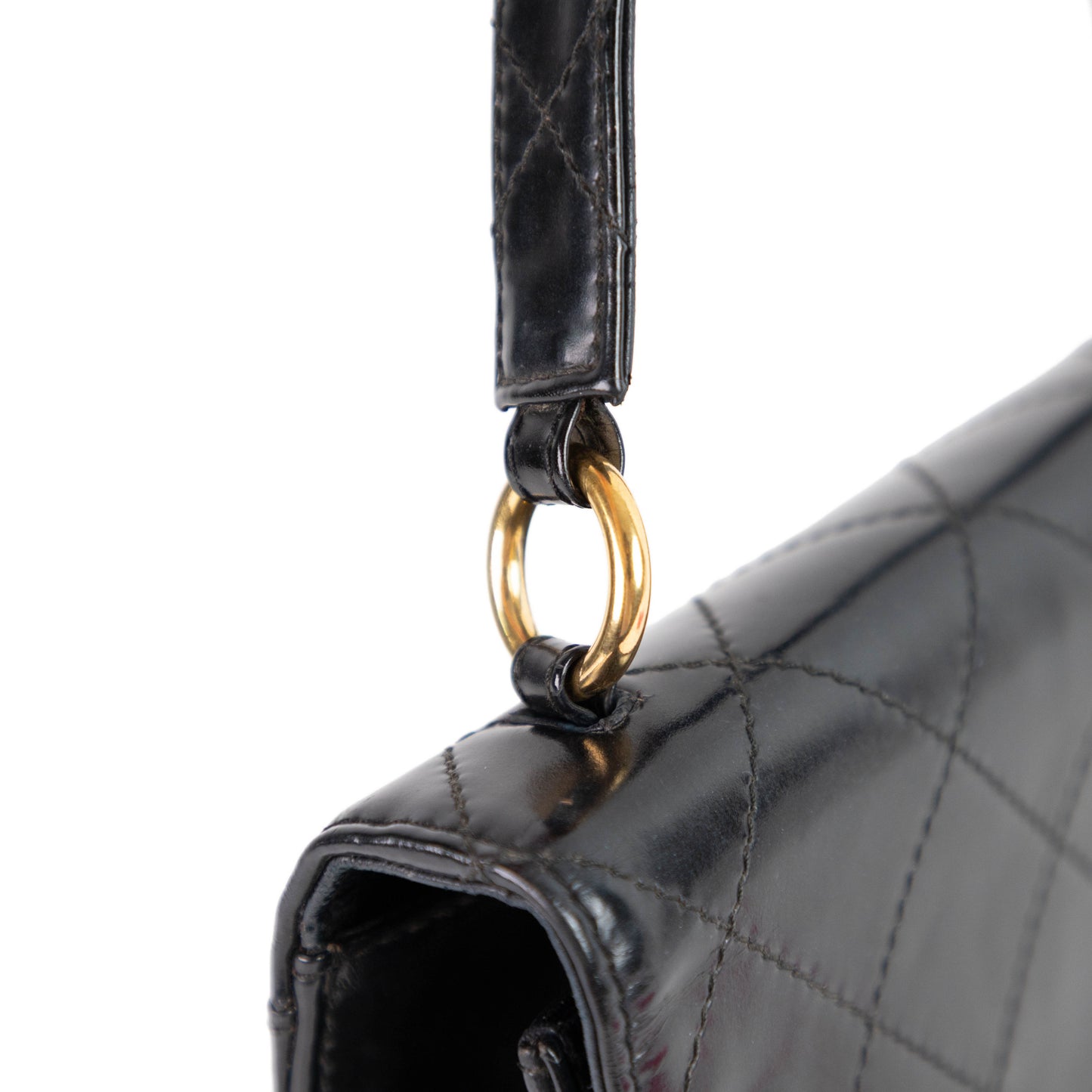 CHANEL quilted flap handle bag